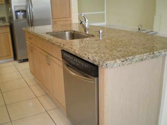 Brand new granite, sink and dishwasher