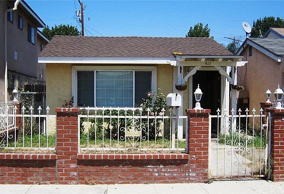 Front yard, low maintenance. Newer Roof, Dual Pane Windows.