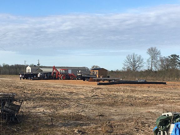 Back View Of Mobile Home and Pad