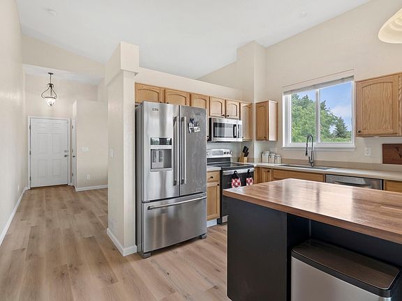 Large Kitchen with brand new appliances and lots of storage.