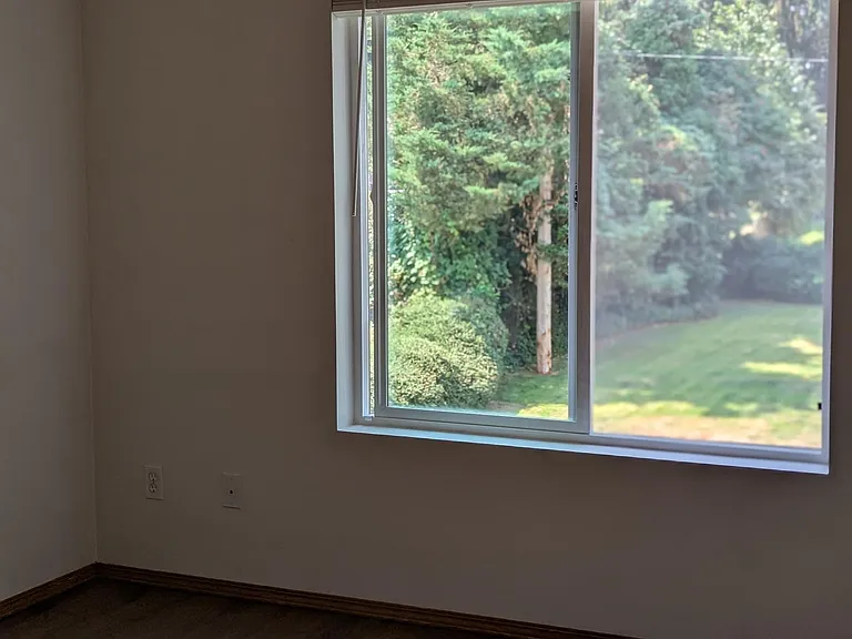 The second and third amply-sized bedrooms have well placed windows.