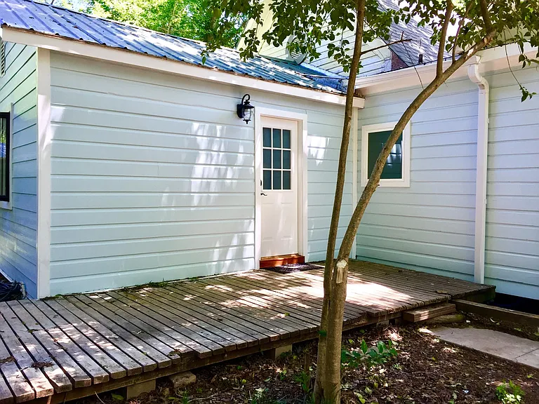Private entrance behind the larger home
