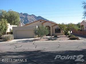 Front of home showing Pusch Ridge views