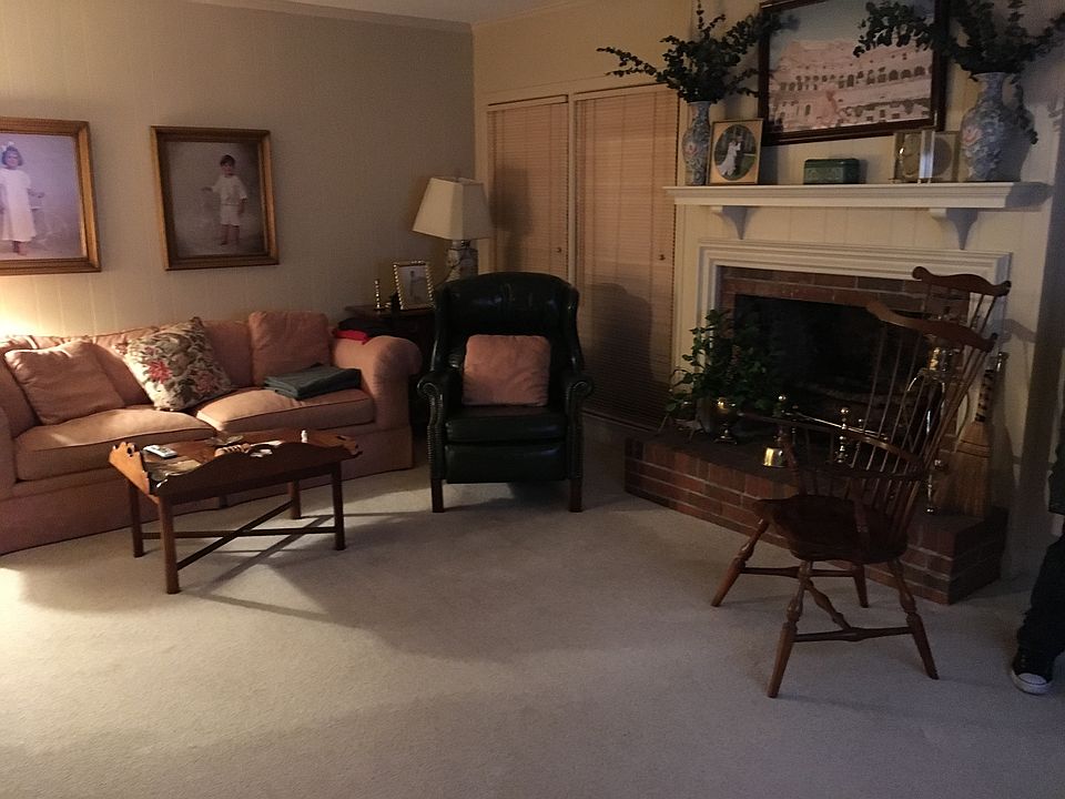 Den and Brick Fireplace