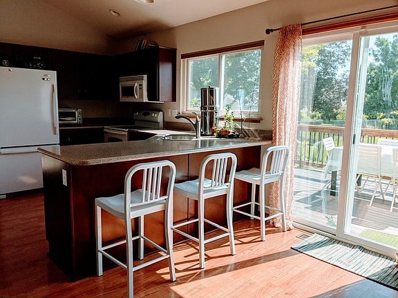 Kitchen. Stove and dishwasher are new and have been replaced with stainless steel versions.