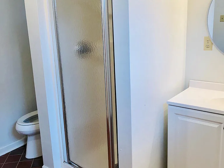 Finished basement stand up shower.