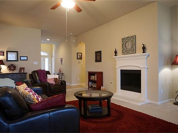 Warm Fireplace and Lots of Light Beaming in from Every Conner.