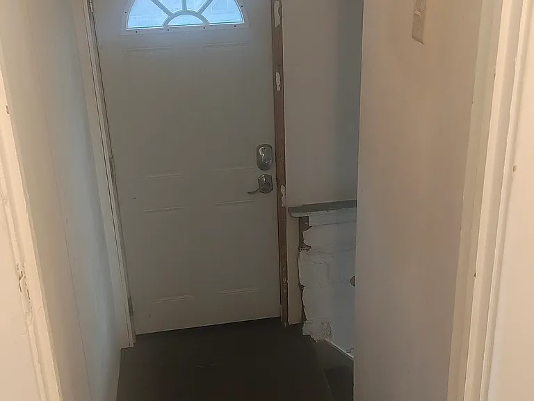 stairs to side door and basement
