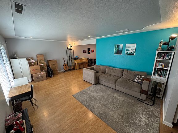 Just inside the front door.