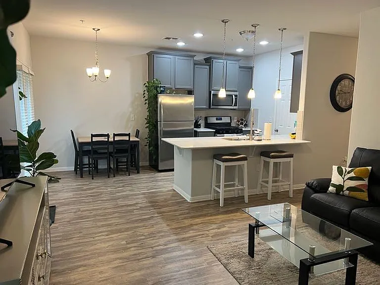 View of kitchen standing in the living room