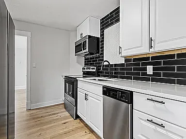 Building Photo - 3101 Tyler St NE #4
