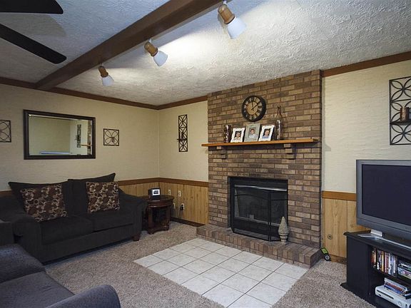 With gas insert. Could be turned back to wood