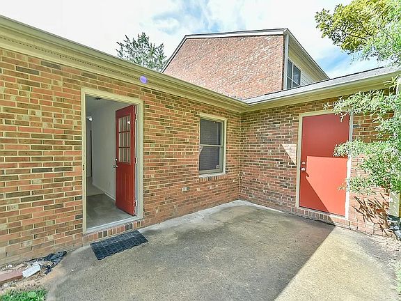 back door, patio, and storage room
