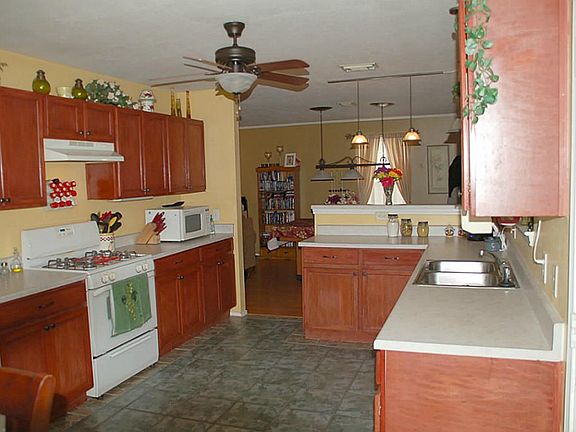 Lots of cabinets in kitchen