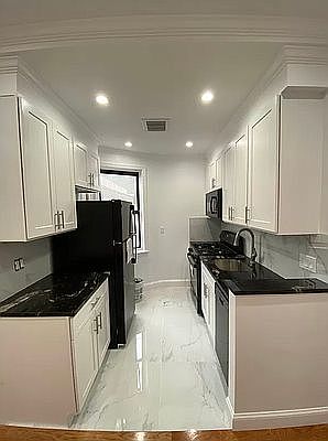 3rd image of 155 E 2nd St #5F