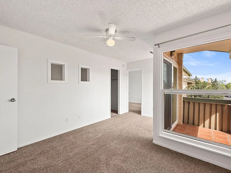 Upper floor living room with new carpet.