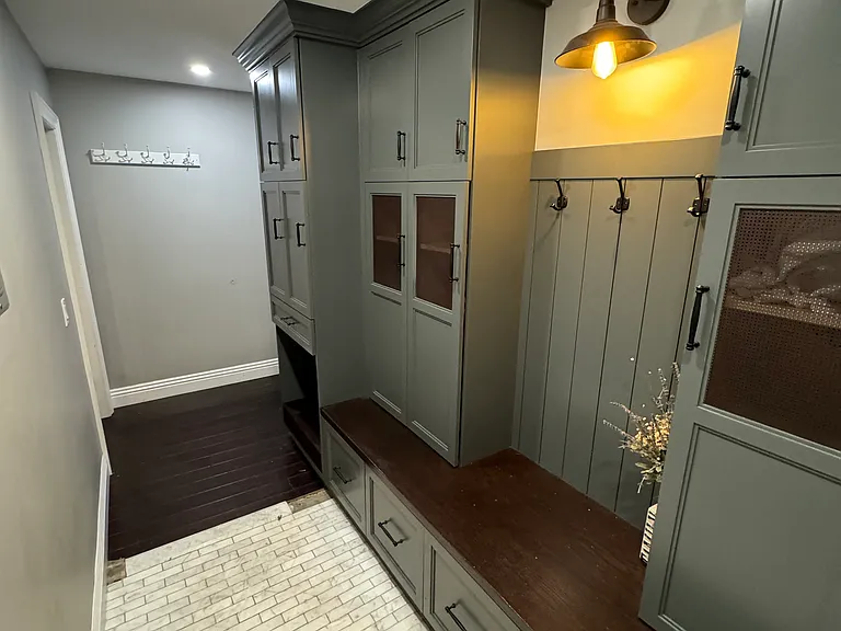 Mud Room that has door to garage and door to side yard