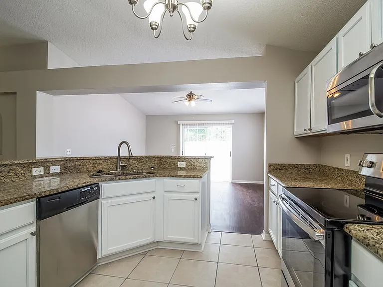 12514 Woodbury Cove Dr — Photo 7