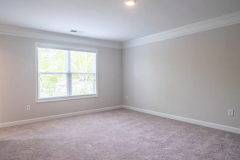 Primary bedroom is spacious!