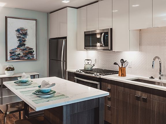 Be your own chef in the stunning kitchens at Modera Buckhead, like this one featuring modern two-tone cabinetry