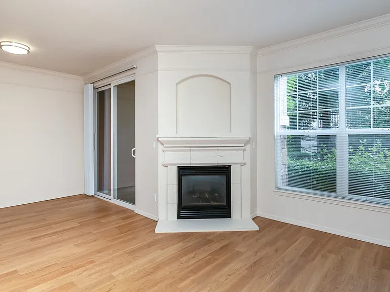 Living Room with Hard Surface Flooring and Fireplace