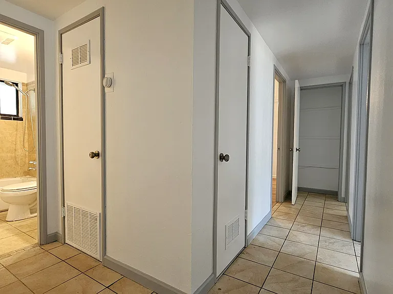 Hallway and common bathroom.