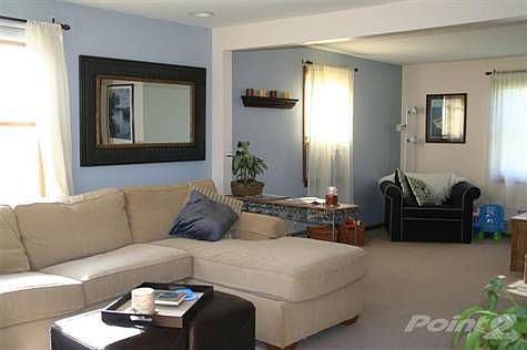 This cozy den space is adjoining the living room and gives flexibility in uses.
