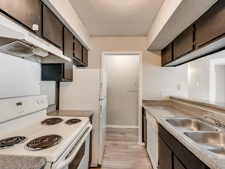Thoughtfully designed kitchens with plenty of cabinet storage and workspace.
