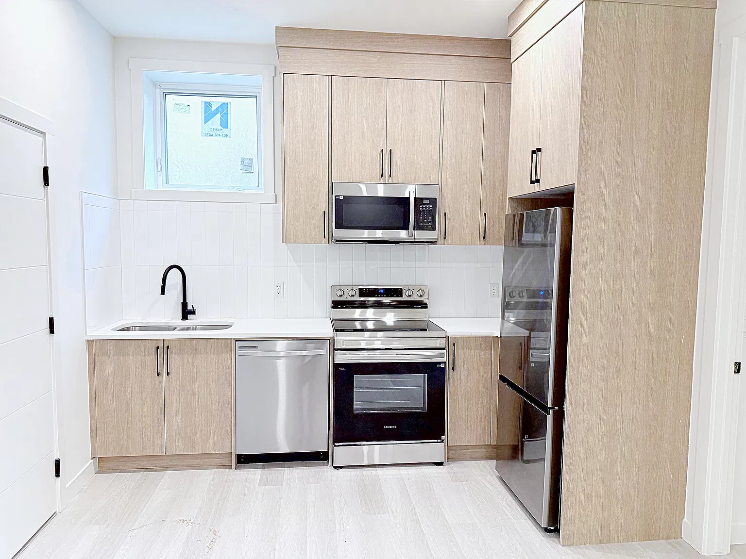 3708 Bow Anne Road NW, (8-Plex), Calgary - Unit 1B — Photo 2