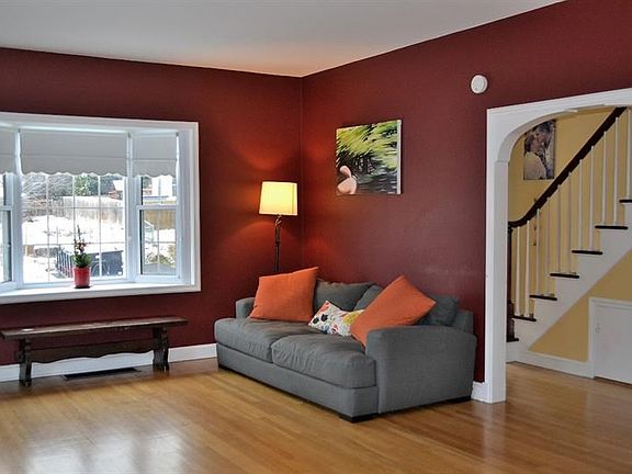 LIVING ROOM.  The archways, hardwood and entry are absolutely lovely!
