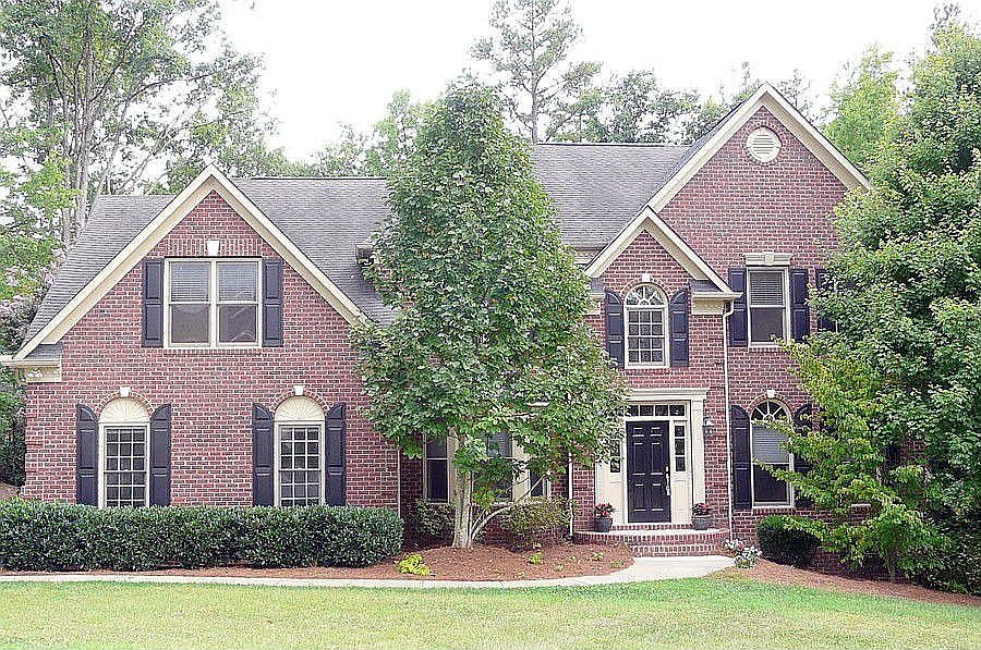 full brick on 1/2acre lot