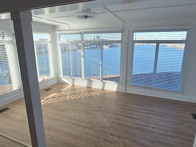 Huge Master Bedroom Suite with waterfront bonus area - the entire upstairs.