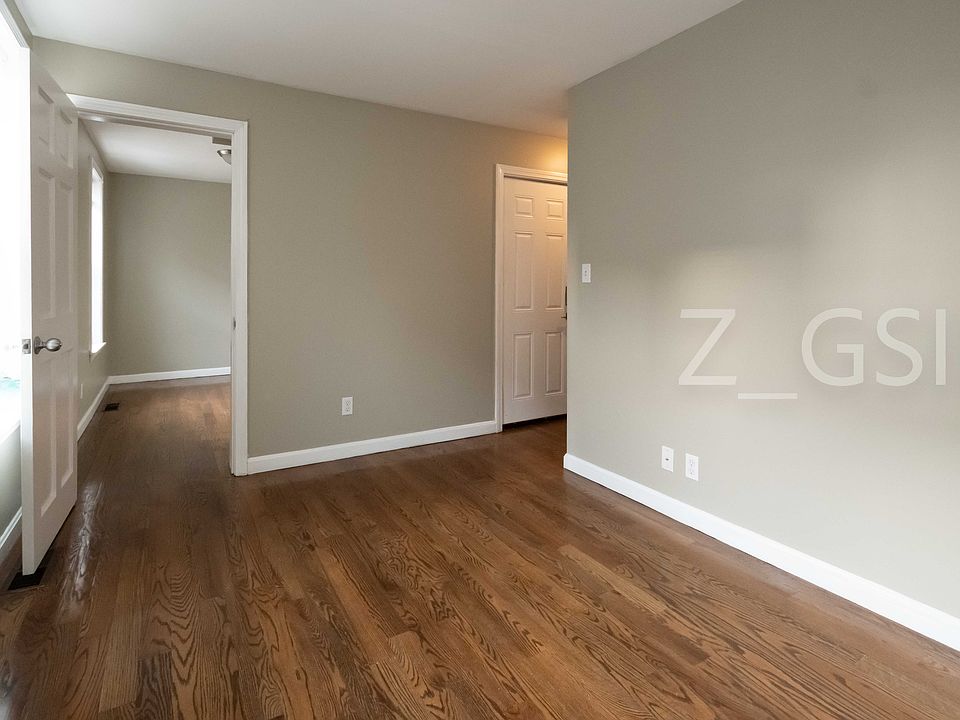 Living room showing door into bedroom