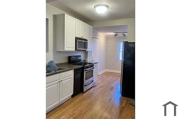 Building Photo - 1554 E 65th Pl #2E