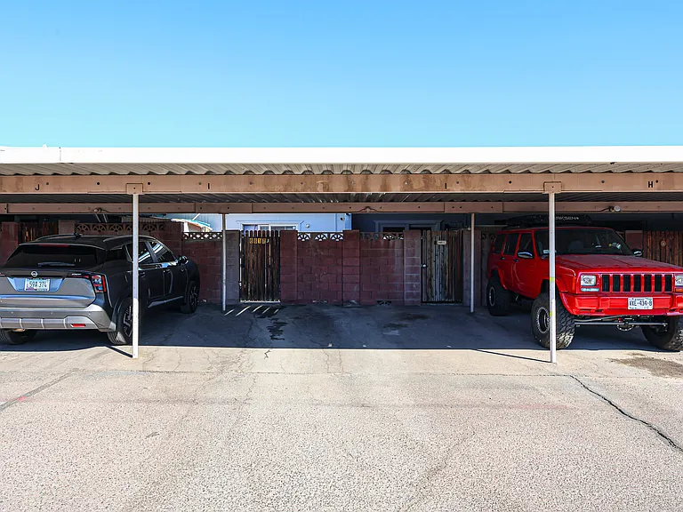 Two designated, covered parking spaces.