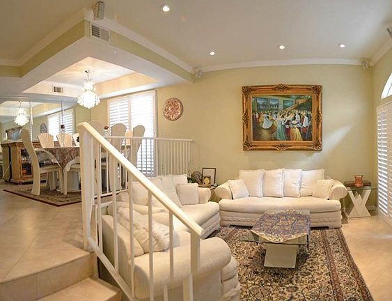 Entryway, Living room with fire place, double pain