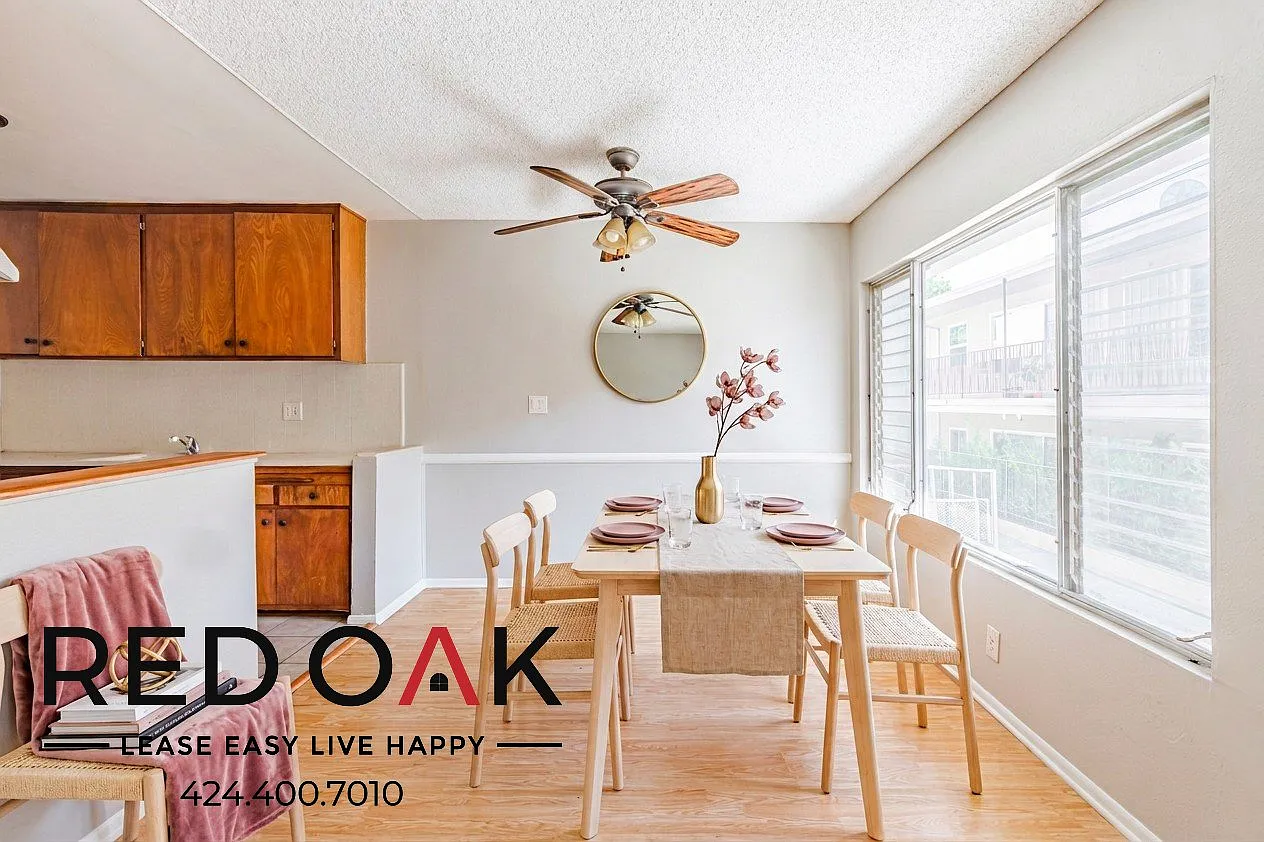Spacious 1-Bed with Open Floor Plan, Air Conditioning, On-Site Laundry and Parking Included in th... — Photo 1