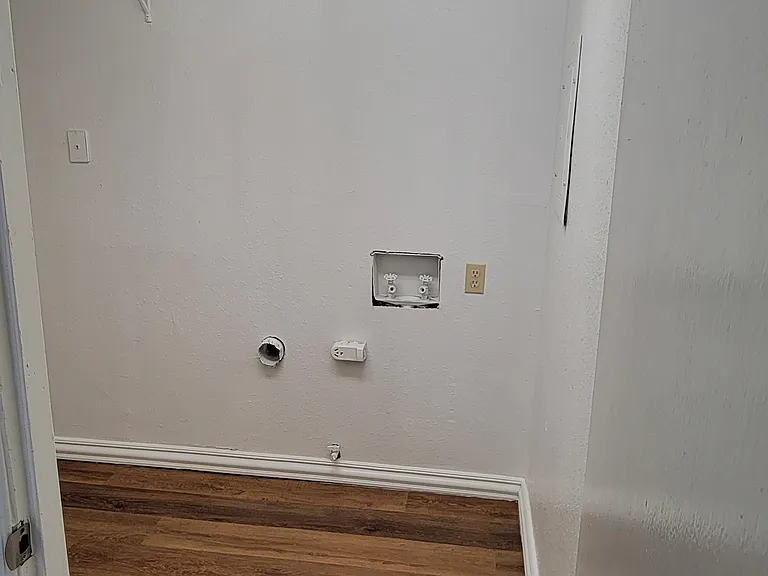 Utility room/closet attached to primary bedroom