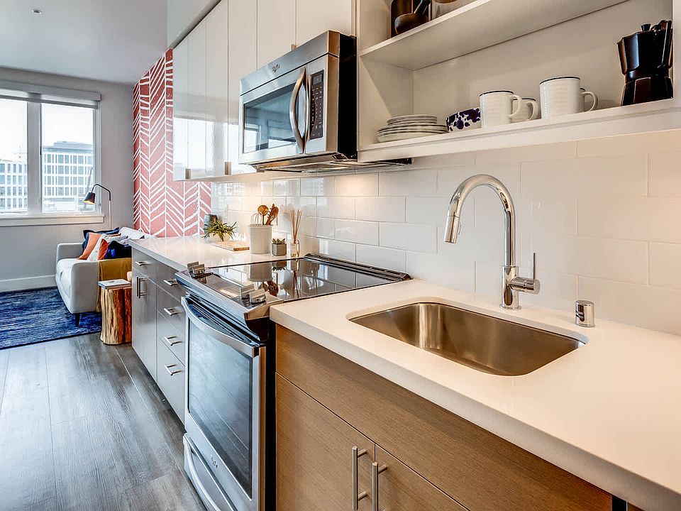 Kitchen with Stainless Steel Appliances and Quartz Countertops