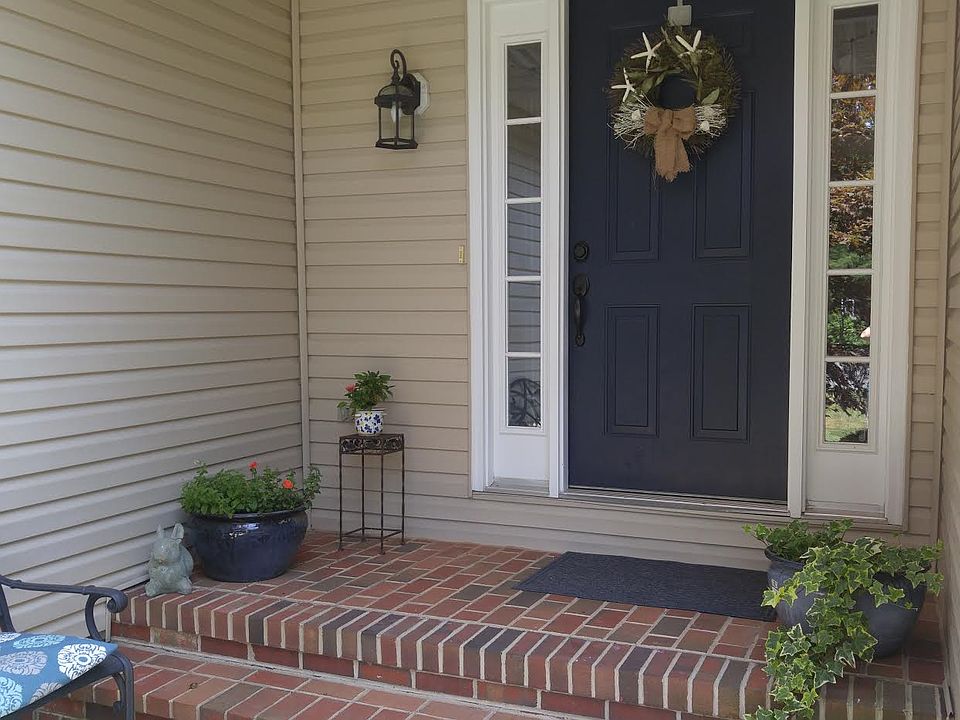 Covered brick front entry
