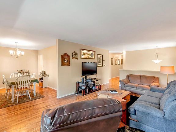 Hardwood floors throughout the dining and living room