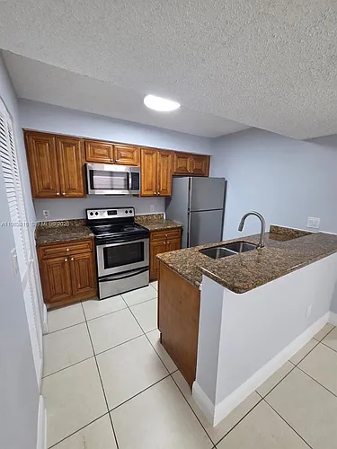 1241 SW 46th Ave #1006 Photo 1