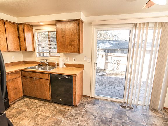 Kitchen looking into backyard