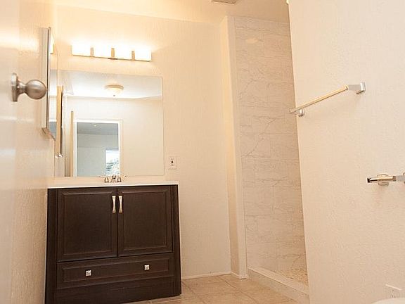 Brand new vanity and tile shower