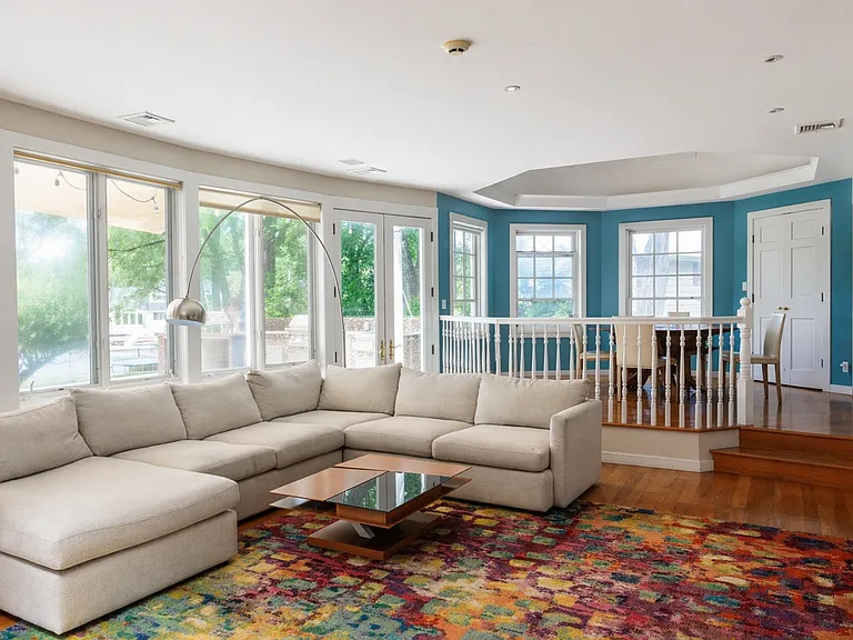 Open-concept family room with access to breakfast nook, kitchen and living room.