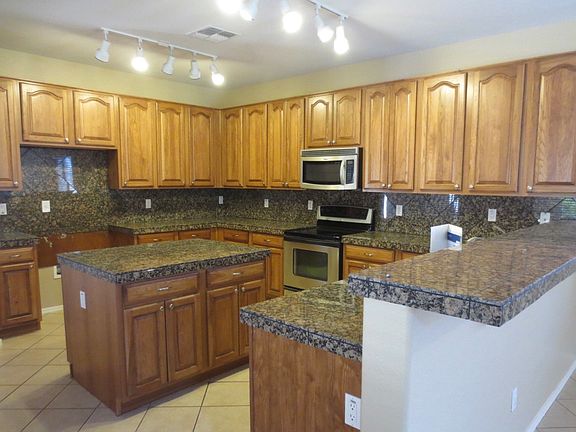 3rd image of 16171 W Port Royale Ln