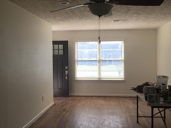 View from Kitchen of Living Area and Front Door.