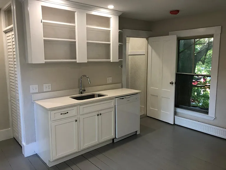 Door leads to washer/dryer and bathroom.