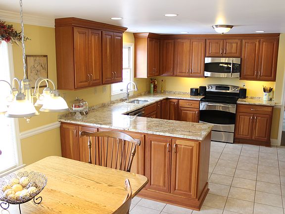 Tall Cherry Custom Cabinets