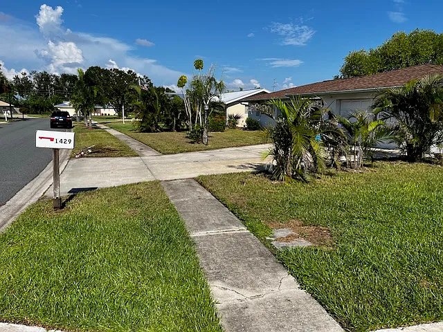 Front of the house with sidewalk